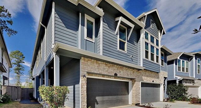 view of side of home with a garage