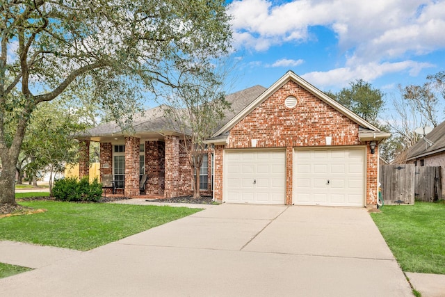 view of front facade featuring a garage and a front yard