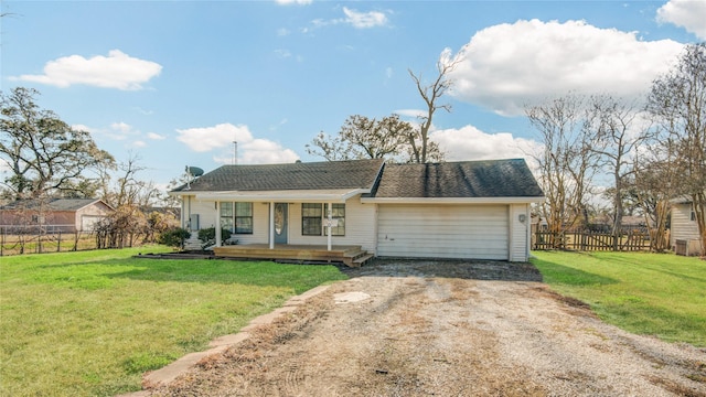 single story home with a garage, a front lawn, and a porch