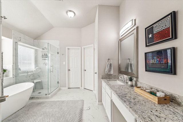 bathroom with vanity, lofted ceiling, and plus walk in shower