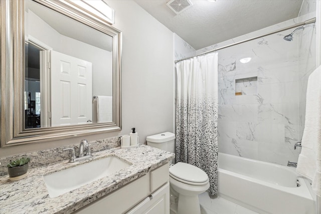 full bathroom with shower / bath combination with curtain, vanity, toilet, and a textured ceiling