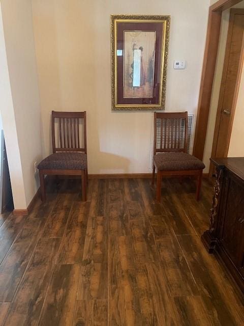 living area with dark wood-type flooring