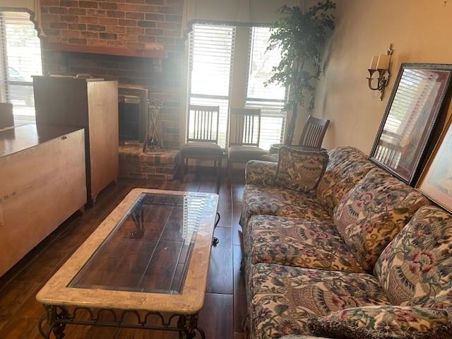 living room with dark wood-type flooring