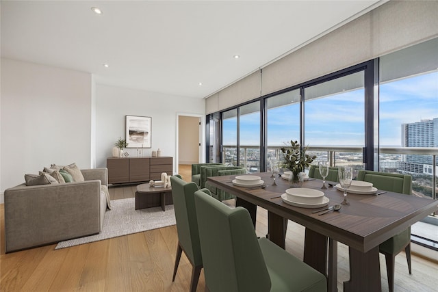 dining room with light hardwood / wood-style flooring