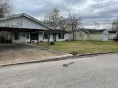 view of front of home with a front lawn