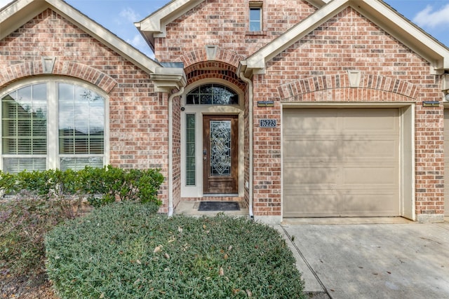 property entrance with a garage