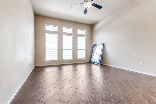 unfurnished room with ceiling fan