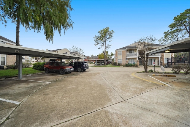 view of parking with a carport