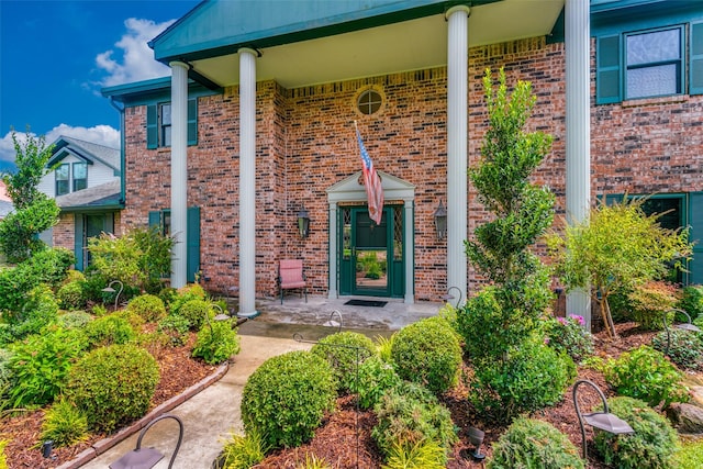 doorway to property with a porch