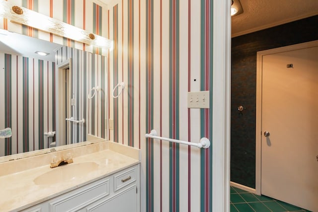 bathroom with vanity and tile patterned floors