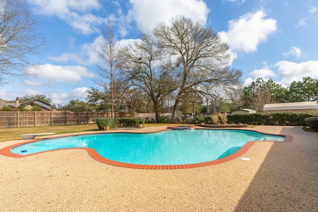 view of pool featuring an in ground hot tub and a patio area