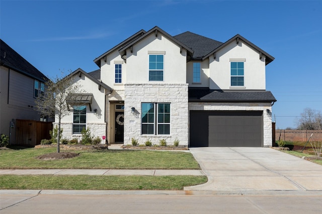 french country home with a garage and a front yard