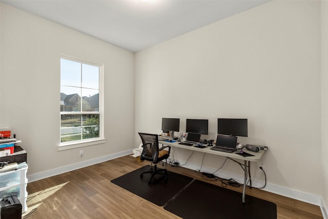 office with hardwood / wood-style floors