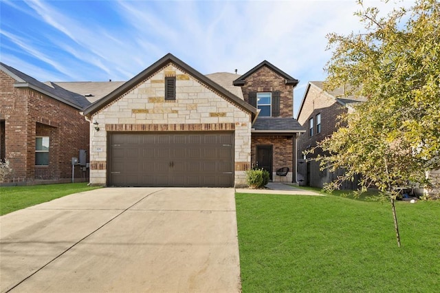 view of front of home featuring a garage and a front yard