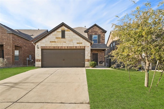 view of front facade with a garage and a front yard