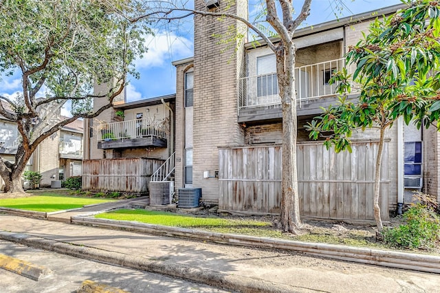 view of property with central AC