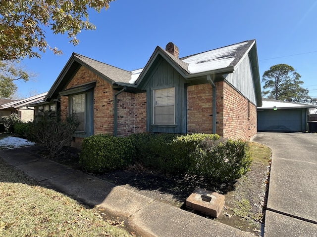 view of side of property featuring a garage