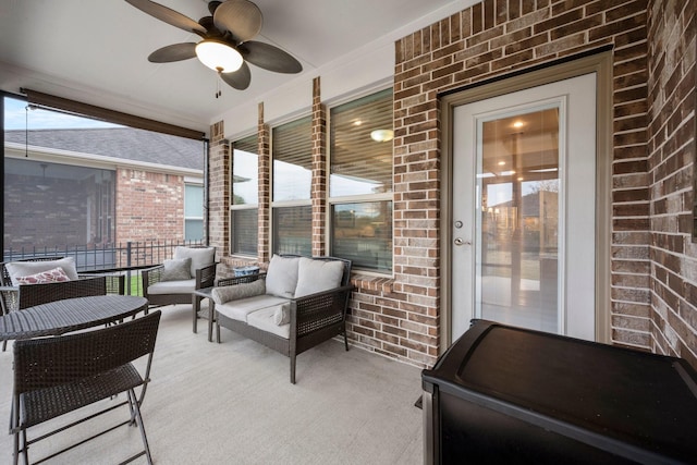 view of patio featuring a ceiling fan and outdoor lounge area