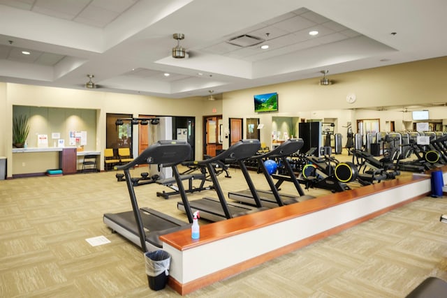 workout area featuring light carpet, visible vents, and recessed lighting