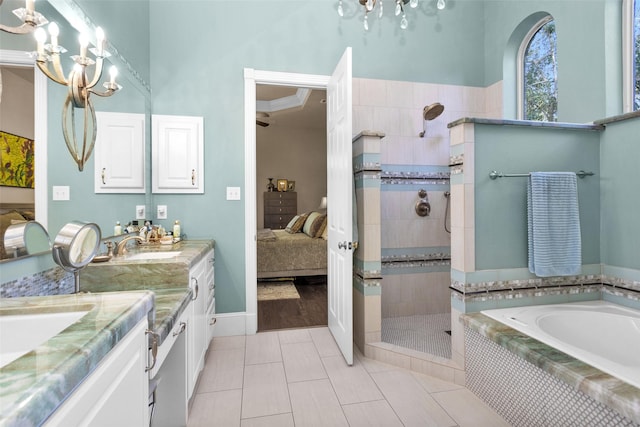 bathroom featuring a chandelier, tile patterned flooring, vanity, separate shower and tub, and crown molding