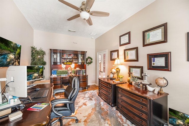 office space with hardwood / wood-style flooring and ceiling fan