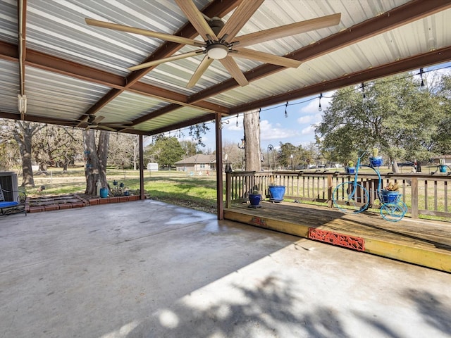 view of patio / terrace featuring a playground, a wooden deck, and ceiling fan