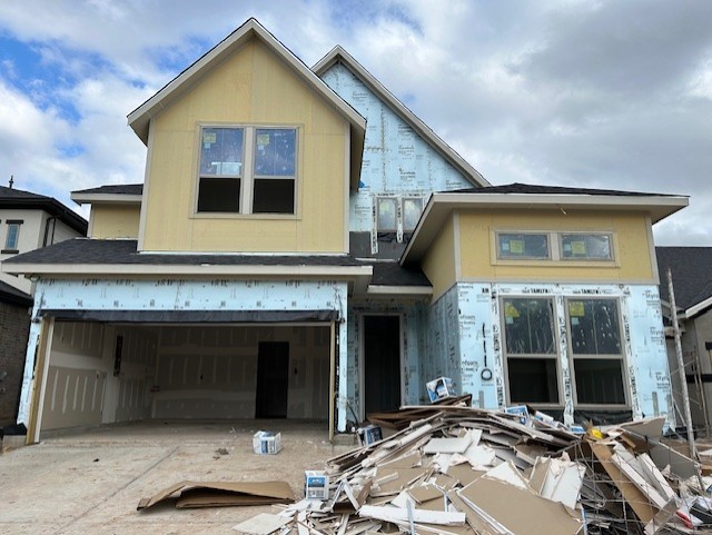 property in mid-construction featuring a garage