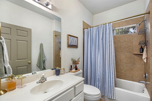 full bathroom featuring vanity, shower / bathtub combination with curtain, and toilet