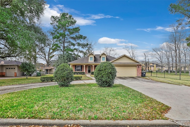 view of front of property featuring a garage and a front lawn