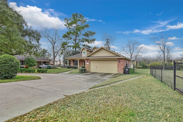 view of front of home featuring a garage and a front yard