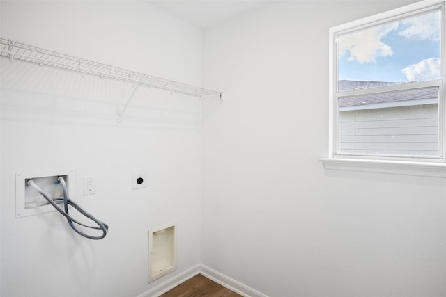 laundry room with hardwood / wood-style flooring, electric dryer hookup, and washer hookup