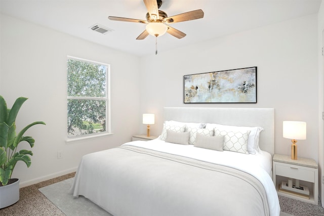 carpeted bedroom featuring ceiling fan