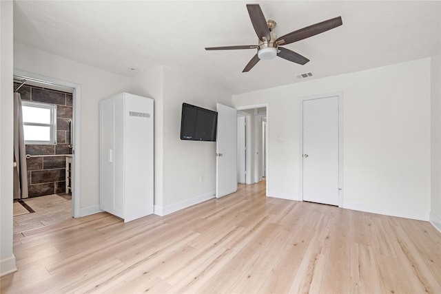 interior space with ceiling fan and light wood-type flooring