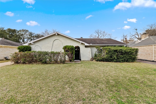 ranch-style house with a front yard