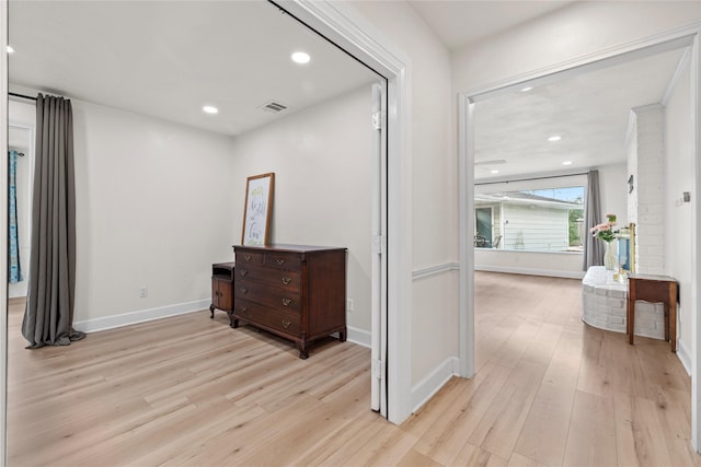 hallway with light wood-type flooring