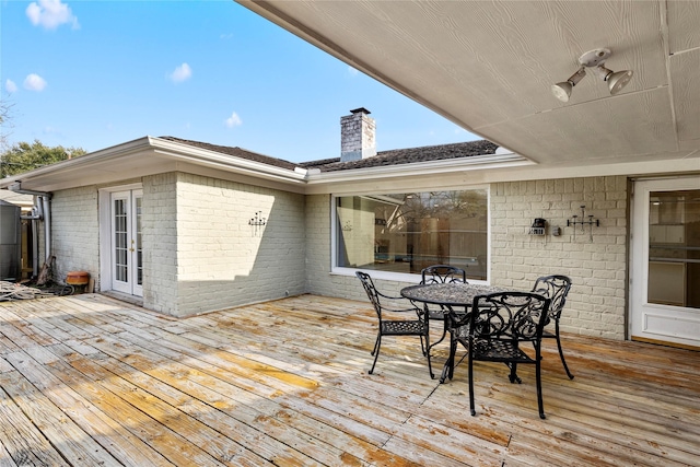 wooden deck with ceiling fan