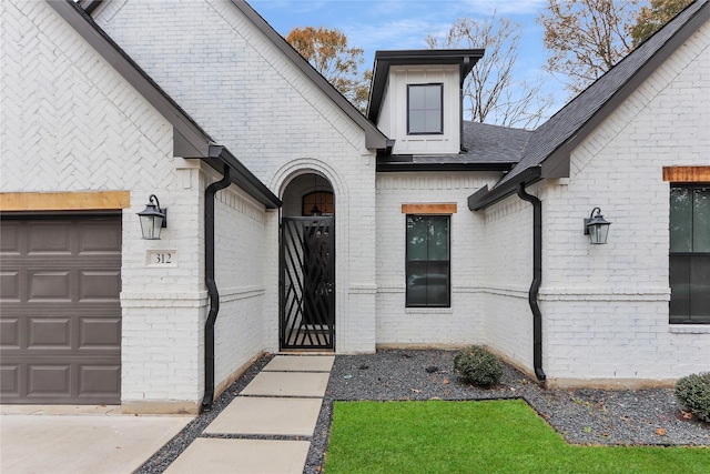 property entrance with a garage