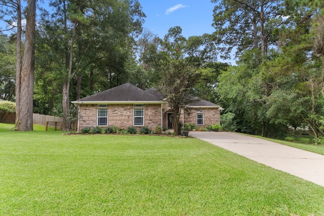 ranch-style house with a front yard