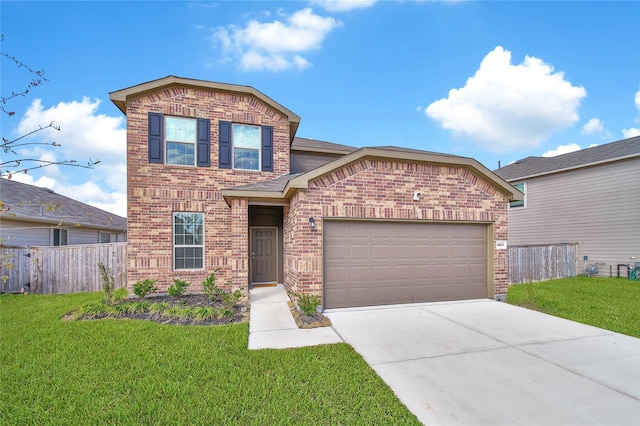 view of front property with a garage and a front lawn