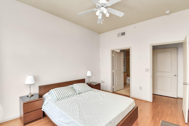 bedroom featuring light hardwood / wood-style floors and ceiling fan