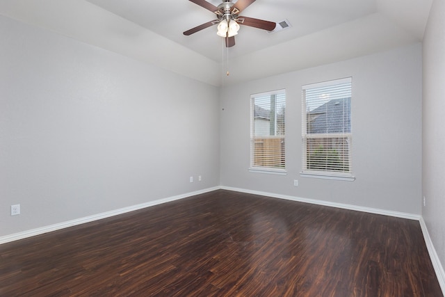 unfurnished room featuring dark hardwood / wood-style floors and ceiling fan