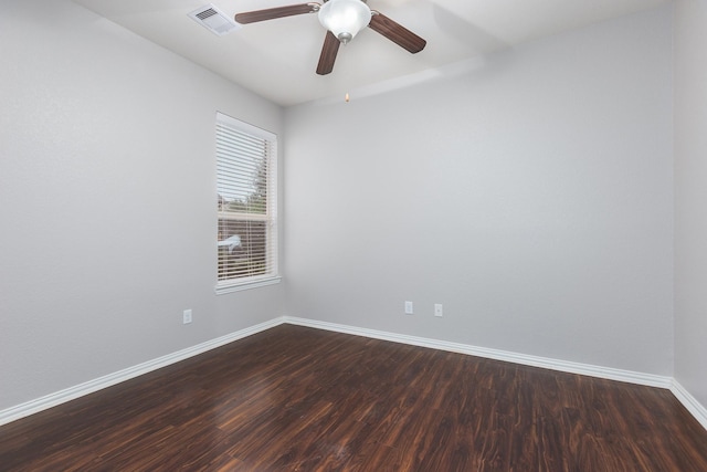 unfurnished room featuring ceiling fan and dark hardwood / wood-style flooring