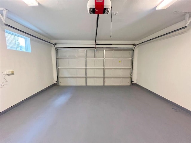 garage featuring a garage door opener