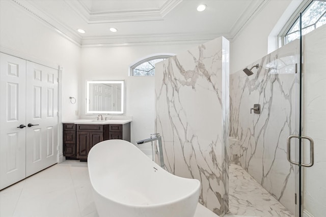 bathroom featuring crown molding, shower with separate bathtub, and vanity