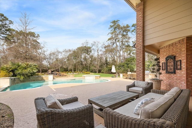 view of swimming pool featuring exterior kitchen, an in ground hot tub, outdoor lounge area, and a patio area