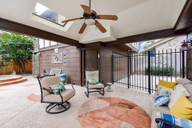 11943 Fawnview Dr, Houston, TX 77070 - view of patio / terrace with ceiling fan, fence, and an outdoor hot tub