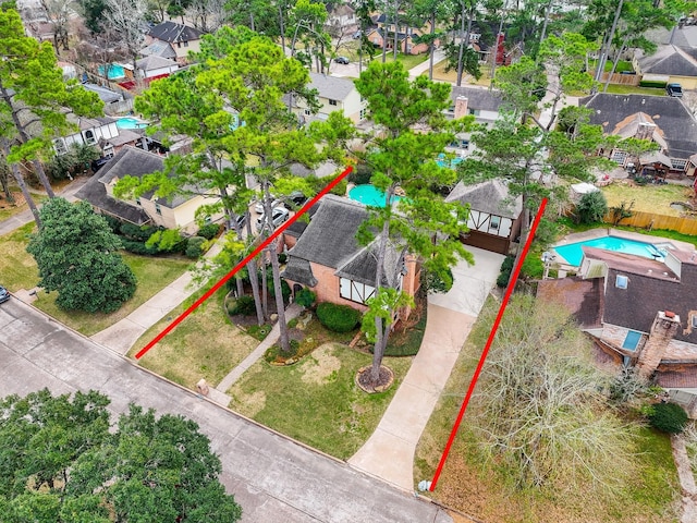 11943 Fawnview Dr, Houston, TX 77070 - aerial perspective of suburban area with a pool