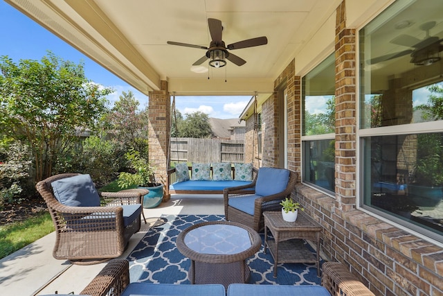 view of patio featuring an outdoor living space and ceiling fan