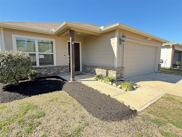 ranch-style home with a garage