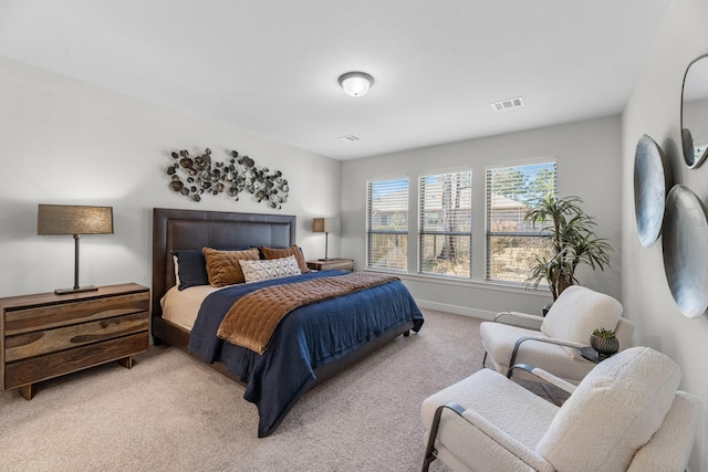 bedroom with light colored carpet